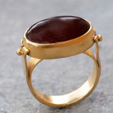Gold solitaire ring