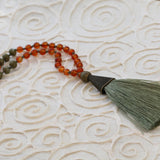 Carnelian Beaded Mala Necklace โข Hand-Knotted Gemstone Jewelry โข Long Boho Necklace with Green Tassel