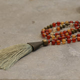 Carnelian Beaded Mala Necklace โข Hand-Knotted Gemstone Jewelry โข Long Boho Necklace with Green Tassel
