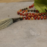 Carnelian Beaded Mala Necklace โข Hand-Knotted Gemstone Jewelry โข Long Boho Necklace with Green Tassel