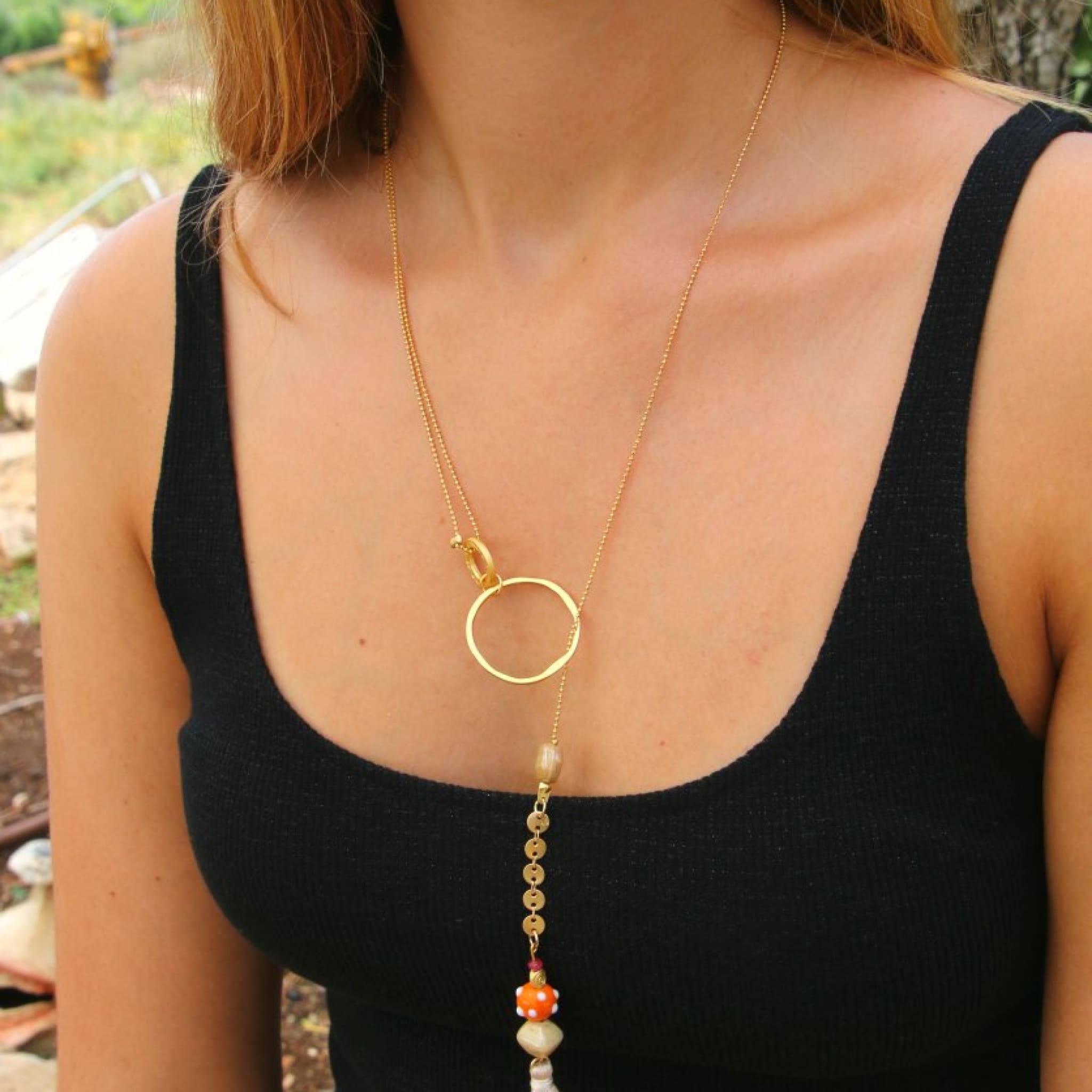 Gold Lariat Necklace With Beige Tassel Necklaces