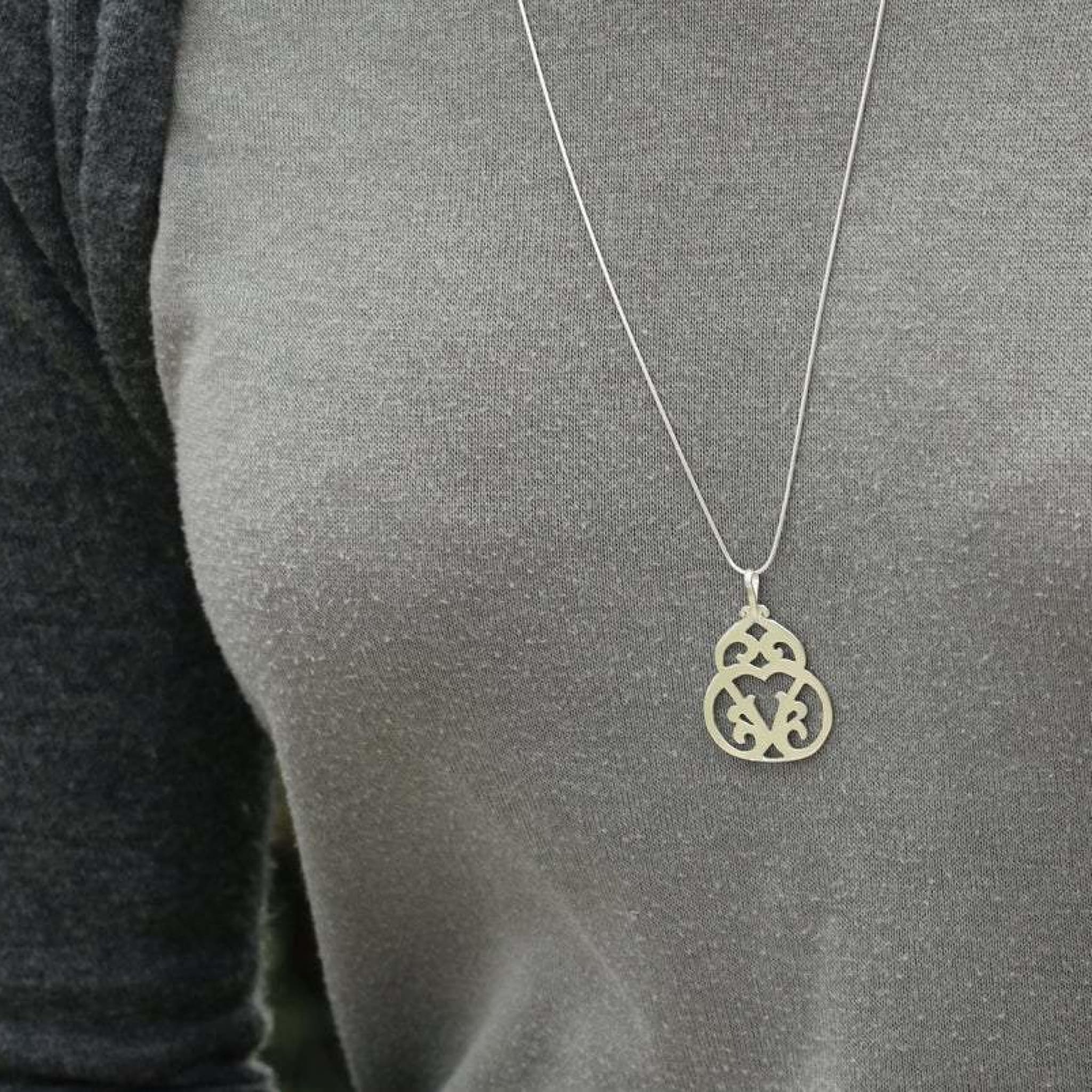 Intricate Silver Pendant Necklace Necklaces